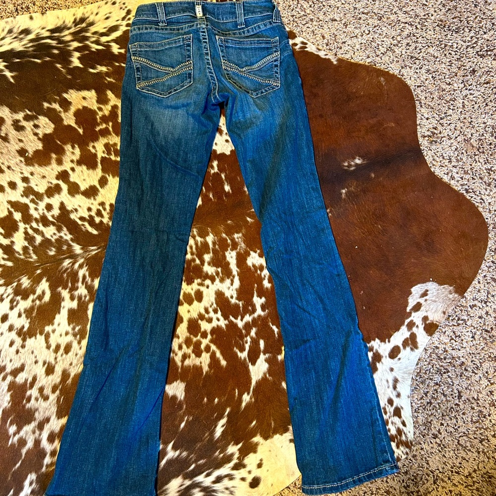 Size 27 long Ariat jeans. Barely worn.